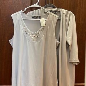 New never worn sleeveless top with matching jacket size xl